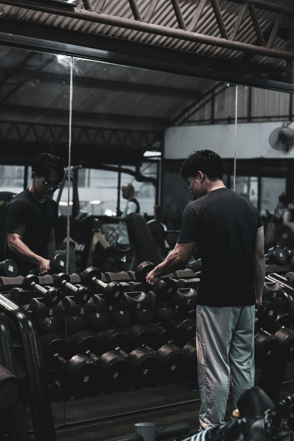 Gym members training